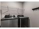 Laundry room with modern washer and dryer at 2829 Wild Laurel Ct, Norcross, GA 30071