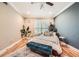This bedroom features hardwood floors, natural light, and modern decor at 3777 Peachtree Ne Rd # 438, Brookhaven, GA 30319