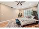 This bedroom features hardwood floors, natural light, and modern decor at 3777 Peachtree Ne Rd # 438, Brookhaven, GA 30319