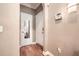 Condo entryway featuring hardwood floors, neutral walls, and entry to additional room at 3777 Peachtree Ne Rd # 438, Brookhaven, GA 30319