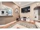 Cozy living room featuring hardwood floors, neutral walls, open to kitchen at 3777 Peachtree Ne Rd # 438, Brookhaven, GA 30319