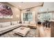 Spacious living room featuring hardwood floors, neutral walls, and large windows at 3777 Peachtree Ne Rd # 438, Brookhaven, GA 30319