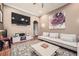 Spacious living room featuring hardwood floors, neutral walls, and modern decor at 3777 Peachtree Ne Rd # 438, Brookhaven, GA 30319