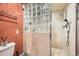 Tiled shower has a glass block wall and dual shower heads at 3777 Peachtree Ne Rd # 438, Brookhaven, GA 30319