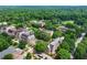 Aerial view of the buildings of Agnes Scott College surrounded by a lot of green trees at 1325 Oakview Rd, Decatur, GA 30030