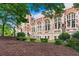 Elegant architecture of a brick college building with arched windows, set amongst landscaped grounds and trees at 1325 Oakview Rd, Decatur, GA 30030