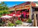 Mezcalito's Cantina with colorful decorations, charming outdoor patio seating, and inviting exterior facade at 1325 Oakview Rd, Decatur, GA 30030