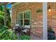 Charming brick front porch with seating area, perfect for relaxing at 1325 Oakview Rd, Decatur, GA 30030