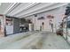 Spacious garage with ample storage cabinets, shelving, and lighting at 1325 Oakview Rd, Decatur, GA 30030
