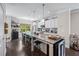 Well-lit kitchen with a large island, bar seating, and modern stainless steel appliances at 1325 Oakview Rd, Decatur, GA 30030