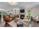 Spacious living room featuring fireplace, comfortable seating, and natural light at 1325 Oakview Rd, Decatur, GA 30030