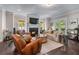 Cozy living room features a fireplace, comfortable seating, and access to a balcony at 1325 Oakview Rd, Decatur, GA 30030