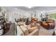 Open-concept living area with dining and kitchen view featuring hardwood floors and neutral decor at 1325 Oakview Rd, Decatur, GA 30030