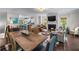 Open concept living area with fireplace, dining space, and kitchen at 1325 Oakview Rd, Decatur, GA 30030