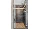 Modern tiled shower with glass door and mosaic accents, complete with sleek hardware and shelving at 3324 Peachtree Ne Rd # 2718, Atlanta, GA 30326