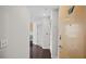 Apartment hallway leading to kitchen with hardwood floors at 3324 Peachtree Ne Rd # 2718, Atlanta, GA 30326