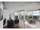 Bright open-concept living and dining area featuring hardwood floors and a stunning city view at 3324 Peachtree Ne Rd # 2718, Atlanta, GA 30326
