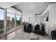 Modern living space featuring city views, wood floors, neutral decor, and access to a balcony at 3324 Peachtree Ne Rd # 2718, Atlanta, GA 30326