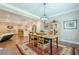 Open layout integrates dining, kitchen, and living areas, perfect for modern living at 5515 Cheatam Ave, Cumming, GA 30040