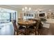 Elegant dining room featuring hardwood floors and a stylish chandelier at 5515 Cheatam Ave, Cumming, GA 30040