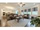 Open concept living room featuring hardwood floors and an eat in kitchen area at 5515 Cheatam Ave, Cumming, GA 30040
