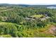 Aerial view showcasing community near pond at 1950 Buford Dam Rd # 205, Cumming, GA 30041