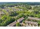 Aerial view featuring the neighborhood amenities, including ponds, community areas, and recreation at 1950 Buford Dam Rd # 205, Cumming, GA 30041