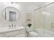 Bright bathroom featuring vanity with granite countertop, brushed nickel faucet and glass enclosed shower at 1950 Buford Dam Rd # 205, Cumming, GA 30041