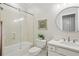 Bathroom featuring vanity with granite countertop, brushed nickel faucet and glass enclosed shower at 1950 Buford Dam Rd # 205, Cumming, GA 30041