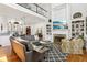 Bright and spacious living room with fireplace, built-in shelving, and views from the balcony at 1950 Buford Dam Rd # 205, Cumming, GA 30041