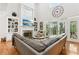 Bright living room with fireplace, built-in shelving, and lots of natural light at 1950 Buford Dam Rd # 205, Cumming, GA 30041