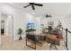 Upstairs sitting area with nice furnishings, ceiling fan, TV, and artwork at 1950 Buford Dam Rd # 205, Cumming, GA 30041