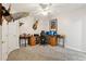 Carpeted home office with multiple computer setups and unique decor at 1950 Buford Dam Rd # 205, Cumming, GA 30041