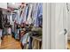 Large walk-in closet offering ample shelving and hanging space at 1950 Buford Dam Rd # 205, Cumming, GA 30041