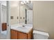 Bright bathroom with a large vanity and lighting and a toilet on the right at 3627 Spring Meadow Court, Acworth, GA 30101