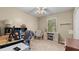 Neutral bedroom with a ceiling fan, large window for natural light, and a comfy chair at 3627 Spring Meadow Court, Acworth, GA 30101
