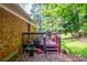 Wooden backyard deck perfect for outdoor seating and overlooking the tranquil, green backyard at 379 Utoy Sw Cir, Atlanta, GA 30331