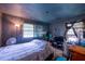 Cozy bedroom featuring natural light and ample closet space at 379 Utoy Sw Cir, Atlanta, GA 30331