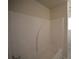 This bathroom features a tub with a white surround at 7753 Hansel Ln, Lithonia, GA 30058