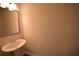 Bathroom features a single sink and classic white fixtures at 7753 Hansel Ln, Lithonia, GA 30058