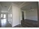 Inviting living room featuring hardwood floors and neutral paint colors at 7753 Hansel Ln, Lithonia, GA 30058