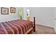 Carpeted bedroom with natural lighting and neutral walls at 144 Wiley Dr, Douglasville, GA 30134