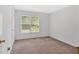 Neutral bedroom with ample natural light from a large window at 144 Wiley Dr, Douglasville, GA 30134