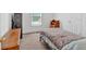 Bedroom with neutral paint, carpeting, and natural light from a window at 144 Wiley Dr, Douglasville, GA 30134