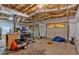 Spacious garage with insulated ceiling, exposed pipes, and multiple garage doors at 144 Wiley Dr, Douglasville, GA 30134