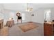 Large living room with brick fireplace, fan, with multiple windows at 144 Wiley Dr, Douglasville, GA 30134