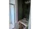 Bathroom with vanity sink, white cabinets, and shower with glass doors at 1750 Beechwood Sw Blvd, Atlanta, GA 30311