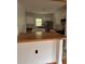 Charming kitchen featuring white cabinets, stainless steel appliances, wood countertops and a bright window at 2037 Brannen Se Rd, Atlanta, GA 30316