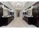 Large bathroom with double sink vanity, lots of storage and dark cabinets at 4115 Falls Ridge Dr, Johns Creek, GA 30022