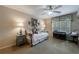 Comfortable bedroom with daybed, neutral walls, and overhead ceiling fan at 4115 Falls Ridge Dr, Johns Creek, GA 30022